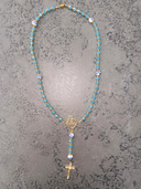 Ave Maria Nomads | Wheel | Turquoise Rozenkrans met Donkerblauwe Kralen - Vergulde ROLLEMAN Logo met Kruis en Magneetsluiting