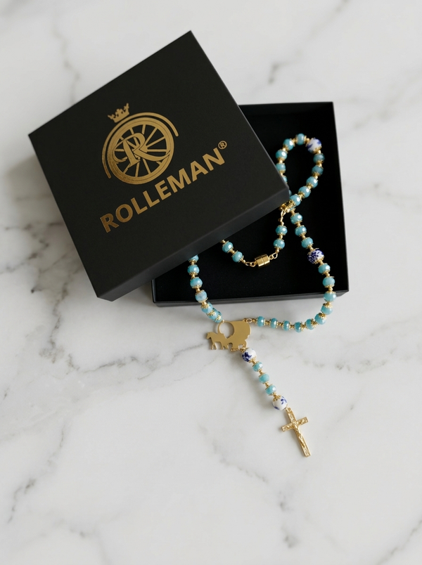 Ave Maria Nomads | Gypsy Wagon | Turquoise Rosary with Dark Blue Beads - Gold-Plated Rolleman Logo with Cross and Magnetic Closure