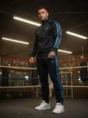 Duke Herren-Trainingsanzug, zweiteilig – Schwarz mit türkisfarbenem Streifen