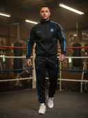 Duke Herren-Trainingsanzug, zweiteilig – Schwarz mit türkisfarbenem Streifen