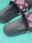Gladys Slides: Black slippers with a ROLLEMAN wheel and a pink flower pattern 