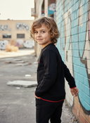 Sweater Tjabo - Kids, zwart met fluor-orange accenten