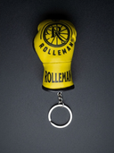 The Punching Prince Mini Glove Keychain with Rolleman Wheel Logo in Neon Yellow